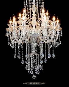 a crystal chandelier hanging from the ceiling