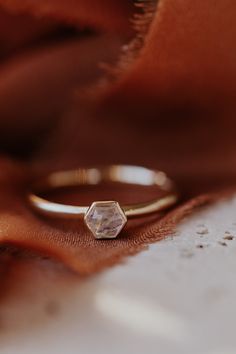 14k gold ring with a 4 mm hexagon moonstone set in a high polish bezel. Available in 14k rose gold or 14k yellow gold. 14k Gold Minimalist Moonstone Promise Ring, 14k Gold Octagon Diamond Ring With Bezel Setting, Rose Gold 14k Moonstone Promise Ring, Fine Jewelry Hexagon Bezel Setting, Octagon 14k Gold Sapphire Promise Ring, 14k Gold Solitaire Ring Octagon Shaped, Rose Gold 14k Ring With Bezel Setting, Hexagon Gemstone Jewelry In 14k Gold, 14k Gold Octagon Ring For Promise