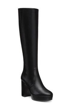 A chunky platform and soaring block heel add statement-making height to a knee-high boot fashioned with a side zipper for easy entry. 3 3/4" heel; 3/4" platform 15 1/4" shaft Side zip closure Leather upper/synthetic and leather lining/leather sole Made in Spain Black Knee High Platform Boots, Modern Black High Shaft Boots, Knee-high Platform Boots With Block Heel, Modern Knee-high Platform Heeled Boots, Chic Knee-high Boots With Chunky Platform, Modern Knee-high Platform Boots With Stacked Heel, Black Knee-high Boots With Stacked Heel, Sleek Platform Boots With Block Heel For Work, Black Knee-high Boots With Reinforced Heel