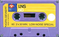 an old purple and yellow cassette with the label lns 60 on it's side