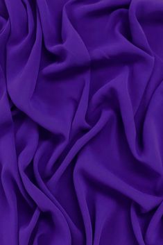 Distinguished by its luxurious design, our high-quality Purple Triacetate Lightweight Matte Crepe fabric is perfect for evening wear, skirts, blouses, pants, shirts, jackets. Originally made in Japan, this exceptionally versatile fabric is the perfect choice for your next projects. Our unique and distinctive fabric is available in a wide selection of colors. Purchase high-quality Triacetate Lightweight Matte Crepe fabric by the Yard at NY Designer Fabrics. Purple Cloth, Marbling Fabric, Luxurious Design, Crepe Fabric, Silk Chiffon, Fabric By The Yard, Evening Wear, Made In Japan, Fabric Design