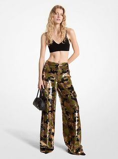 The utility-chic cargo pant gets a glamorous update. Designed in a sequined camouflage print fabric with a fitted waist and wide leg, these wide-leg pants feature classic cargo pocket styling at each side. Pair them with a crop top and heels for your next night out. Camouflage Print, Michael Kors Collection, Cargo Pocket, Cargo Pant, Denim Pant, Wide Leg Trousers, Print Fabric, Bottoms Pants, Cargo Pants