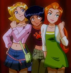 three young women standing next to each other