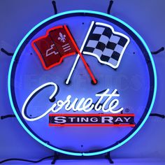 a neon sign that says couvette string ray with flags on the front and back