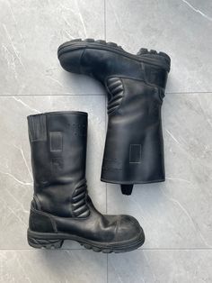 1960s Vintage Fireman Boots  Color: Black  ⌖ Heavy-duty leather ⌖ shaft seams ⌖ Safety steel toe ⌖ leather ankle padding ⌖ Heat-resistant, slip-resistant Nitrile rubber ⌖ shell outsole with air chamber damping ⌖ Pull-on loops ⌖ Height: 13″ Please note all items are examined to the best of our ability. Most items are 20+ years old and are not in perfect condition small imperfections are to be expected any major flaws will be disclosed. Industrial Leather Boots With Steel Toe, Industrial Leather Boots With Reinforced Toe, Industrial Steel Toe Leather Boots, Industrial Leather Safety Boots, Industrial Leather Boots For Outdoor, Combat Style Leather Waterproof Boots With Vibram Sole, Leather Combat Waterproof Boots With Vibram Sole, Leather Safety Boots With Protective Metal Feet, Leather Boots With Protective Metal Feet For Safety