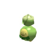 an image of a green object with two faces on it's head and one eye closed