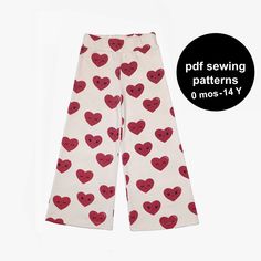 a pair of pants with hearts printed on them