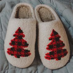 Christmas Time Only Comes Once A Year! Welcome The Yuletide Season In Comfort Wearing These Cozy Fuzzy Holiday Slippers! Fluffy And Comfy, The Faux Sherpa Fur Slippers Feature A Trendy Red And Black Buffalo Plaid. Color: White Features: Hard Bottom Soles Faux Sherpa Fur Christmas Tree Motifs Care: Hand Wash Warm; Hang To Dry Size: S/M Fits Sizes 6-7 M/L Fits Sizes 8-9 L/Xl Fits Sizes 10-11 Boutique Bundle & Save! Holiday Slippers, Buffalo Plaid Christmas Tree, Christmas Slippers, Plaid Christmas Tree, Comfy Slippers, Cool Christmas Trees, Home Slippers, Buffalo Plaid Christmas, Fuzzy Slippers