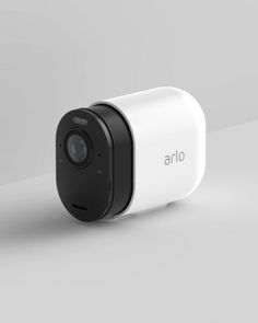 an arlo camera sitting on top of a table