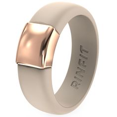 a wedding band with a rose gold square in the center