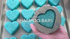 blue heart shaped sugars are being made with the words making shampoo bars