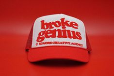 Broke Genius! TRUCKER HATS HAND MADE & MADE TO ORDER LOCATED IN LOS ANGELES, CA  HIGH QUALITY GET YOUR'S TODAY! CAP FEATURES: 100% Polyester Front 100% Nylon Mesh Back 5-panel cap Seamless Foam Front Panel with Lining 8 Rows Stitching on Visor Matching Fabric Under visor Adjustable Plastic Snap Affordable Letter Print Curved Bill Trucker Hat, Retro Trucker Hat For Streetwear, Retro 5-panel Trucker Hat For Streetwear, Novelty Snapback Trucker Hat For Streetwear, Red Six-panel Trucker Hat For Streetwear, Streetwear Six-panel Trucker Hat With Embroidered Logo, Beer Design, Shirt Design Inspiration, Hat Designs