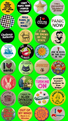 many different types of buttons on a green background