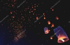 many lanterns floating in the air at night with lights on them stock photo 549872