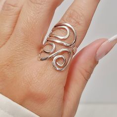 Description: Handcrafted In 92.5 Sterling Silver With A Unique Swirl Pattern And Polish Top Finish Giving A Unique Appearance. A Fabulous Statement Ring To Wear Daily To Elevate Your Look To Any Occasion. Light, Thin Wrap Style Material: Metal: 925 Sterling Silver Finish: High Polish Ring Measurements: Top Length: 27 Mm Width: 19.4 Mm Band Width: 3.6 Mm 925 Stamped Lightly Adjustable Weight: 4 Grams K E E P I N T O U Ch Https://Instagram.Com/Emmaverajewelry Https://Www.Facebook.Com/Emmaveradesig Swirl Ring, Bohemian Colors, Wrap Ring, Bohemian Rings, Boho Ring, Swirl Pattern, Wrap Rings, Boho Rings, Womens Jewelry Rings