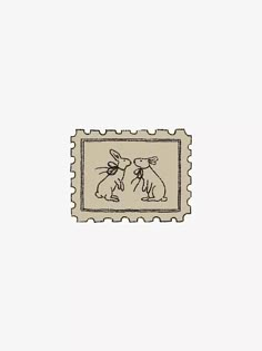 a stamp with two dogs on it and one is in the shape of a dog