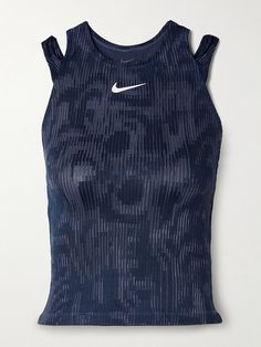 a women's nike tank top in blue and white