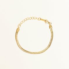 This is the bracelet from herringbone collection. Simple design in the herringbone snake chain. A perfect piece for your layering game. | Shapes Studio Herringbone Flat Chain Bracelet Flat Snake Chain, Butterfly Anklet, Gold Snake Chain, Minimalist Women, Herringbone Chain, Bracelet Minimalist, Snake Chain Bracelets, Gold Snake, Chain Anklet