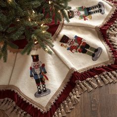 a christmas tree skirt with nutcrackers on it