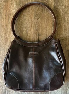 Rosetti Women's Brown Faux Leather Shoulder Bag Tote Round Handle. Nice condition. Bottom does have a couple white spots. See photos. 11" wide 9" height Round Handle, Purses And Handbags, Leather Shoulder Bag, Shoulder Bags, Faux Leather, Angeles, Tote Bag, Shoulder Bag, Handbags