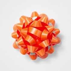 an orange bow on a white background