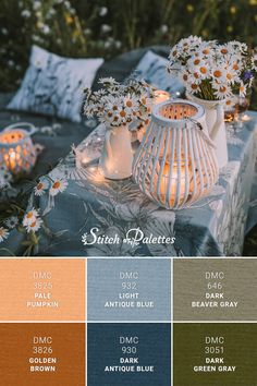 the color scheme for an outdoor dining table with daisies and other flowers on it