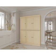 a kitchen with marble floors and white walls