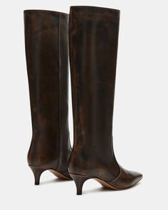 Upgrade your boot game with the LANDER boots. These boots have a square toe, knee-high length, and a trendy kitten heel and elevate any outfit while providing comfort and support. Perfect for everyday wear or dressing up for a night out. 2 inch heel height 14.75 inch shaft circumference 15.25 inch shaft height Leather upper material Textile and synthetic lining Synthetic sock Synthetic sole Imported Brown Kitten Heel Boots, Fitted Knee-high Boots With Sculpted Heel For Fall, Fitted Mid-calf Heeled Boots With Stacked Heel, Fitted Mid-calf Boots With Stacked Heel, Fitted Boots With Sculpted Low Heel, Fitted Knee-high Boots With Reinforced Heel And Square Toe, Fitted Mid-calf Boots With Reinforced Heel, Classic Low Heel Knee-high Boots For Fall, Wide Calf Low Heel Mid-calf Boots For Fall