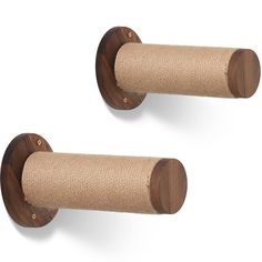 two wooden wall mounted toilet paper holders on a white background, one is made out of wood and the other is made from rope