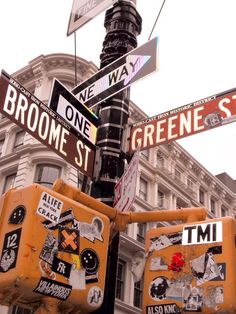 the street signs are clearly visible for everyone to see on this pole in new york city