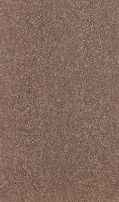 a close up view of a brown surface