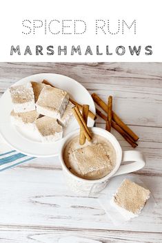 marshmallows on a white plate with cinnamon sticks in the background and text overlay that reads, spiced rum marshmallows