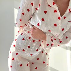 The perfect blend of romance and relaxation Fall in love with the charming heart-patterned design that adorns our Lover's Pajama Women's Loungewear Set. A visual symphony of affection, perfect for cozy nights and lazy mornings. These pajamas aren't just sleepwear; they're a matching ensemble designed for unforgettable moments. The cutest trouser matching pj set. Dive into comfort with the matching pajamas, featuring a trouser pajama that seamlessly combines style and ease. Our Lover's pjs are cr Cute Aesthetic Pajamas, Cute Sleepwear Aesthetic, Cute Pyjama Sets, Pyjamas Aesthetic, Heart Pyjamas, Pyjama Aesthetic, Pjs Aesthetic, Cute Pj Sets, Sleepwear Aesthetic