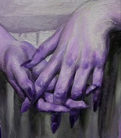 two purple hands holding each other over a white table top with blue paint on it