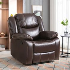 a brown recliner chair in a living room