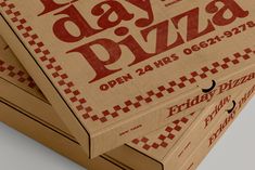 three pizza boxes stacked on top of each other with the words happy day pizza printed on them