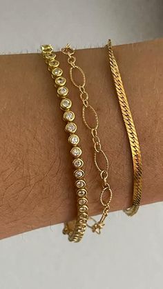 Tennis bracelet Hailey Bieber jewelry celebrity bracelet luxe jewelry bracelet stack Hailey Bieber Jewelry, Celebrity Bracelets, Stars Bracelet, Stacked Beaded Bracelets, Figaro Bracelet, Gold Bracelets Stacked, Gold Minimalist Jewelry, Luxe Jewelry