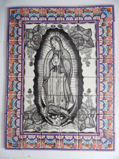 a tile mural depicting the virgin mary