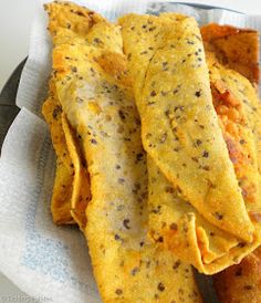 an omelet is sitting on a napkin