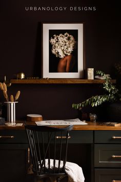 a desk with flowers on it and the words urbanlogy designs above it in white