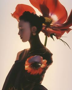 a woman with flowers in her hair