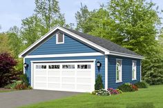 a blue two car garage sitting in the middle of a lush green field