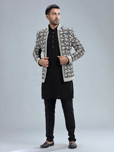 Stiched with fine Terry rayon fabric, this black Indo-Western is all you need for the ethnic collection. This one is adorned with embroidery, mirror, and stone work, and the whole look is completed with the matching pant as well. Add this to your cart now. Embroidery Mirror, Mens Wedding Attire, Groom Wear, Indo Western, Stone Work, Groom Dress, Rayon Fabric, Western Outfits, Wedding Attire