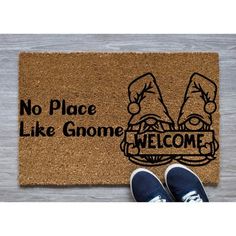 a door mat that says no place like gnomes welcome