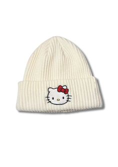 Stay warm and adorable this winter with Mabel Love Co's Hello Kitty Beanie. This cute and cozy beanie features the beloved Hello Kitty design, making it a perfect accessory for fans of all ages. Crafted from high-quality, soft materials, this beanie ensures comfort and warmth during chilly days. The playful design adds a fun touch to your winter wardrobe, making it a great choice for casual outings, winter activities, or simply staying warm at home. Whether you're a long-time Hello Kitty fan or White Casual Acrylic Beanie, Trendy White Acrylic Beanie, White Acrylic Casual Beanie, Adjustable Soft White Beanie, Cute White Soft Knit Beanie, Trendy Warm White Beanie, Cute Cotton Beanie Cap, Cute Cotton Cap Beanie, Cute White Knitted Beanie