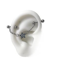 Whether you are a piercing enthusiast or just looking to add a touch of elegance to your look, this industrial piercing will express your individuality and unique style. My handmade industrial piercing jewelry with short bars provides a more comfortable and secure fit, allowing you to showcase your style without any compromise. The shorter bars ensure a perfect fit, avoiding any discomfort. you can wear the bars without the chains 316L surgical steel bars to avoid the risk of allergic reactions and for greater comfort 14 gauge or 16 gauge https://www.etsy.com/ca/shop/triballook Spiky Ear Piercing, Chained Industrial Piercing, Aesthetic Helix Piercing, Industrial Piercing Alternative, Faux Industrial Piercing, Floating Industrial Piercing, Cute Industrial Piercing Jewelry, Dainty Industrial Piercing, Piercing Decoration