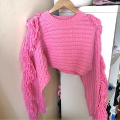 Statement Making Fringe, Hot Pink Sweater By Hot N Delicious. Soft Fabric, Cable Knit Detail, And Crop Style., Such A Unique Piece. Barbie Color Pink. New With Tags! Size S. Fitted Tassel Tops For Fall, Winter Long Sleeve Tops With Tassels, Trendy Fringe Tops For Winter, Ripped Sweater, Black Duster, Blanket Cardigan, Hot Pink Sweater, Aztec Sweater, Crop Style