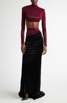 Balletcore meets dominatrix edge in this cropped bolero made from skin-tight faux leather in a seasonal-favorite oxblood hue. 14 1/2" length (size Medium) Open front Portrait neck Long sleeves 68% polyester, 27% polyurethane, 5% spandex Dry clean Made in the USA Designer Clothing Leather Bolero, Glamorous Aesthetic, Leather Maxi Skirt, Laquan Smith, Free Fabric, Polyester Spandex, Clothing Items, Maxi Skirt, Designer Clothing