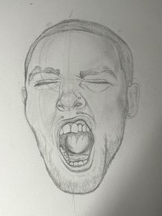 a pencil drawing of a man's face with his mouth open and tongue out