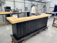 a workbench in a factory with lots of tools